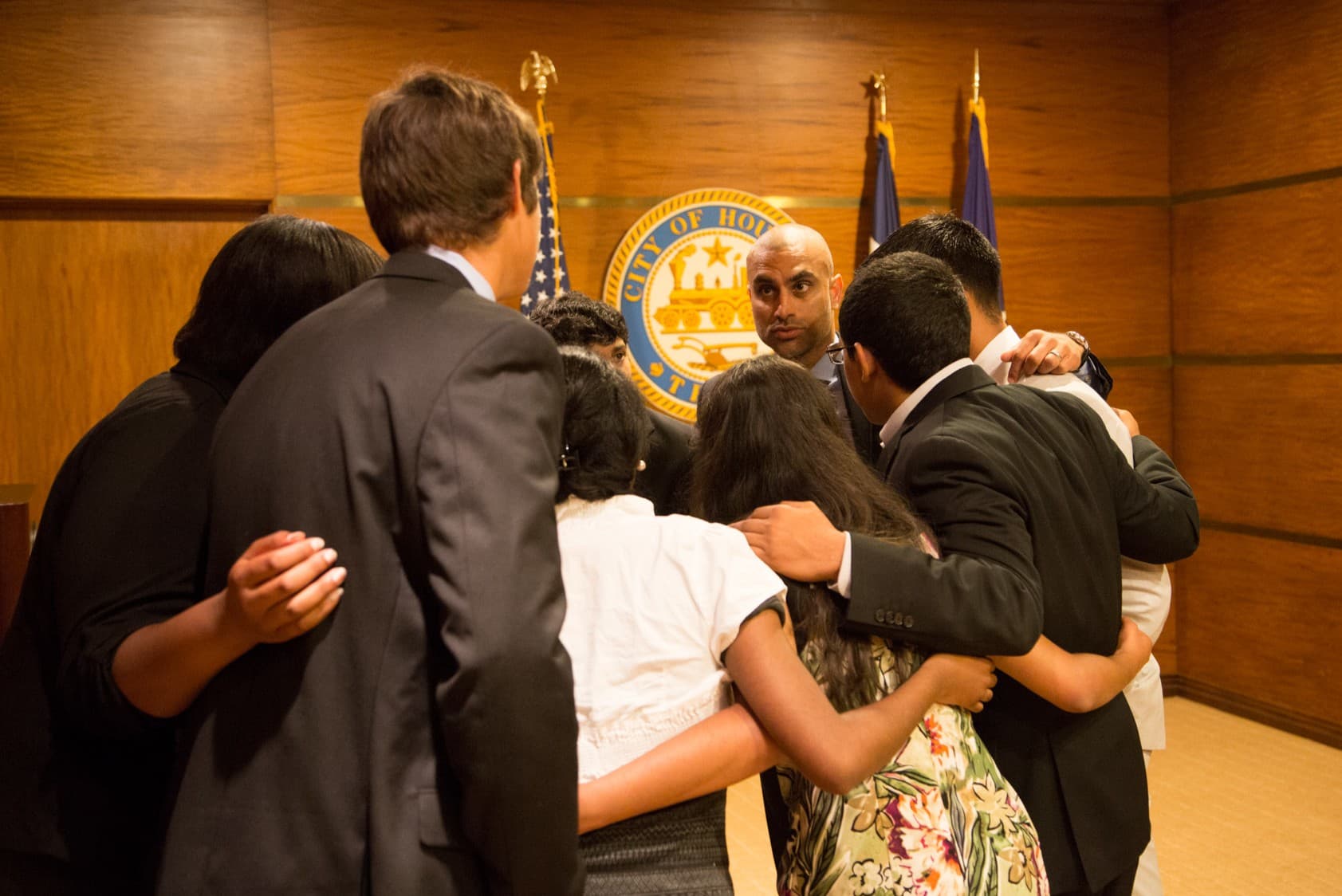 An early Atlas Scholars cohort huddled together at Houston City Hall